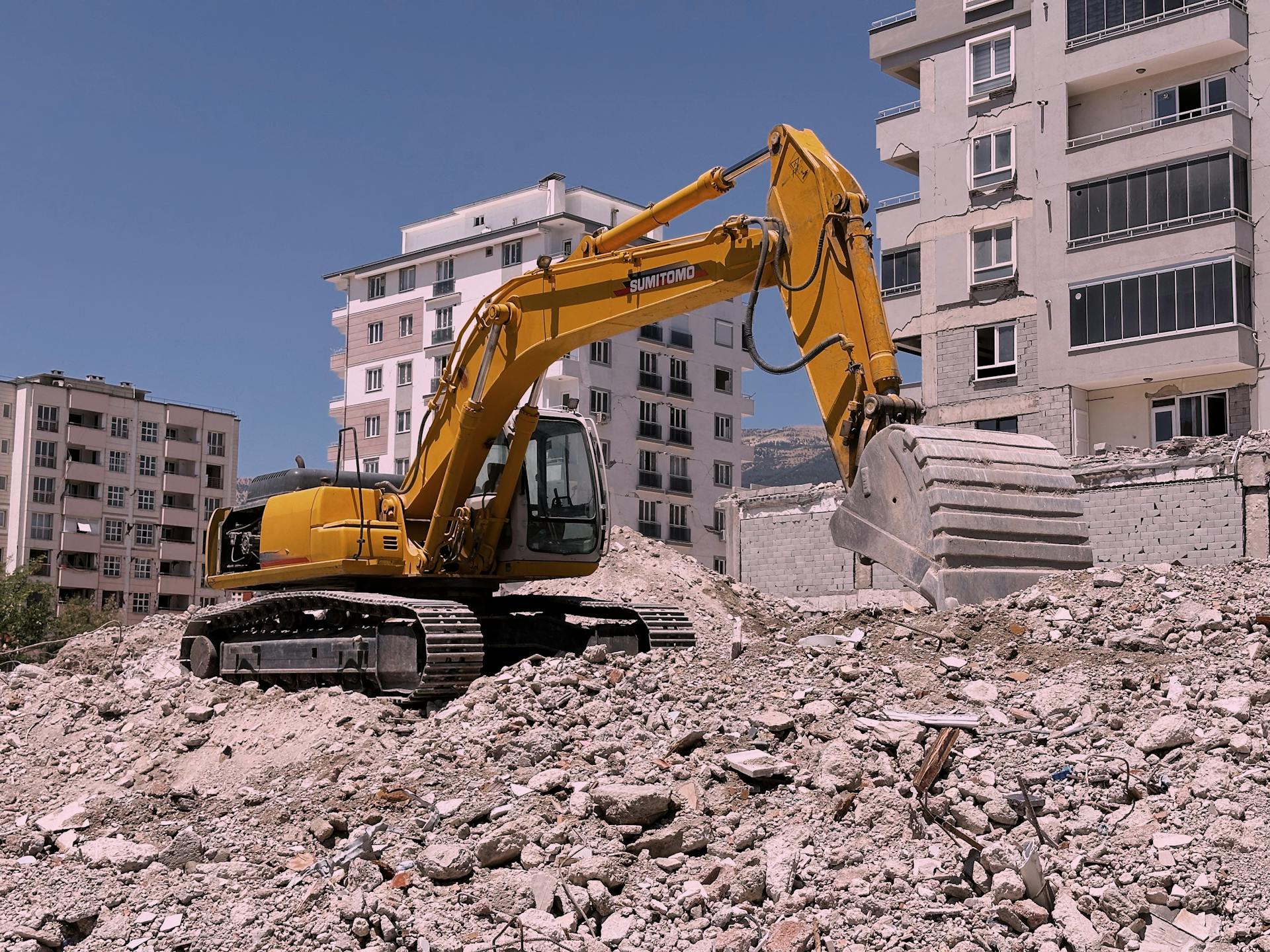 excavator-in-ruins-in-town excavator-in-ruins-in-town